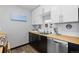 Modern kitchen features butcher block counters, stainless steel appliances, and ample storage at 1606 Cottonwood Dr # 24S, Louisville, CO 80027