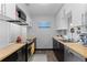 Well-equipped kitchen with stainless steel appliances and butcher block countertops at 1606 Cottonwood Dr # 24S, Louisville, CO 80027