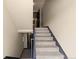 A staircase that provides access to the upper levels of the building at 1606 Cottonwood Dr # 24S, Louisville, CO 80027