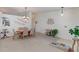 Bright dining room with a large table and neutral decor at 12935 Lake Circle Dr, Thornton, CO 80241