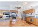 Bright kitchen featuring stainless steel appliances and light wood cabinetry at 12935 Lake Circle Dr, Thornton, CO 80241