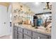 Chic bar area boasting granite countertops, stylish cabinetry, and ample space for beverage preparation at 1490 S Salem Way, Aurora, CO 80012