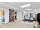 Finished basement with workout area and bonus space, perfect for entertaining at 1490 S Salem Way, Aurora, CO 80012