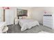 Cozy bedroom featuring plush carpet and an accent wall at 1490 S Salem Way, Aurora, CO 80012