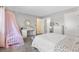 Bright bedroom featuring plush carpet, a vanity and ample storage at 1490 S Salem Way, Aurora, CO 80012