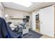 Home office offers ample lighting, modern desk and black office chair at 1490 S Salem Way, Aurora, CO 80012