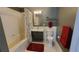 Bright bathroom with modern vanity, ample lighting, and a clean, tiled shower-tub combo at 475 W 12Th Ave # 8H, Denver, CO 80204