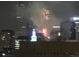 Spectacular city view at night with colorful fireworks illuminating the skyline at 475 W 12Th Ave # 8H, Denver, CO 80204