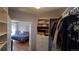 Organized walk-in closet providing ample storage space and convenient access to the bedroom at 475 W 12Th Ave # 8H, Denver, CO 80204