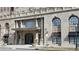 Grand building exterior featuring architectural details, arched windows, and a stately entrance at 475 W 12Th Ave # 8H, Denver, CO 80204