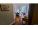 Bright hallway with wood floors leading to living spaces with lots of light at 475 W 12Th Ave # 8H, Denver, CO 80204