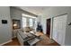 Cozy living room with lots of natural light, comfortable seating, and hardwood floors at 475 W 12Th Ave # 8H, Denver, CO 80204