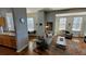 Bright living room with hardwood floors, stylish rug, and comfortable gray sofa at 475 W 12Th Ave # 8H, Denver, CO 80204