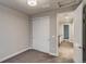 Bedroom with closet and view of hallway at 5185 Vivian St, Wheat Ridge, CO 80033
