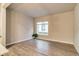 Bright living area with hardwood floors and large windows, offering ample natural light at 5185 Vivian St, Wheat Ridge, CO 80033