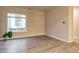 Spacious living room with neutral paint and hardwood floors, creating a comfortable ambiance at 5185 Vivian St, Wheat Ridge, CO 80033