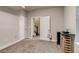 Comfortable carpeted room with neutral paint and wine storage near the window at 5185 Vivian St, Wheat Ridge, CO 80033