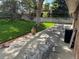 Spacious backyard patio perfect for outdoor dining and entertaining with mature trees at 10366 E Ida Ave, Greenwood Village, CO 80111