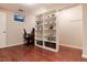 Office space in basement with lots of storage in built-in shelving unit at 10366 E Ida Ave, Greenwood Village, CO 80111