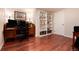 Home office space in basement with built-in shelving unit at 10366 E Ida Ave, Greenwood Village, CO 80111