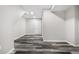 Finished basement area with laminate flooring at 1811 S Quebec Way # 151, Denver, CO 80231