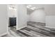 Basement bathroom with navy vanity and walk-in shower at 1811 S Quebec Way # 151, Denver, CO 80231
