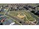 An aerial shot of the local park showing the playground and common area of the community at 3011 Low Meadow Blvd, Castle Rock, CO 80109