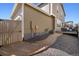 Private backyard with gravel pathway leading to a fenced area, perfect for outdoor activities and relaxation at 3011 Low Meadow Blvd, Castle Rock, CO 80109