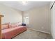 Cozy bedroom with neutral walls, carpet, a twin day bed, window, and a closet at 3011 Low Meadow Blvd, Castle Rock, CO 80109