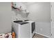 Clean laundry room with washer and dryer at 3011 Low Meadow Blvd, Castle Rock, CO 80109