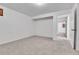 Finished basement area with carpet flooring at 2879 S Xanadu Way, Aurora, CO 80014
