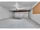 Spacious garage with overhead lighting at 2879 S Xanadu Way, Aurora, CO 80014