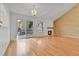 Bright living room featuring a fireplace and a sliding door leading to the deck at 2879 S Xanadu Way, Aurora, CO 80014