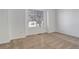Bedroom with natural light from a large window and neutral colored carpet at 2335 E Cherrywood Dr, Lafayette, CO 80026