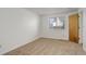 Well-lit bedroom featuring neutral carpet and a window at 2335 E Cherrywood Dr, Lafayette, CO 80026