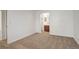 Bright bedroom with en-suite bathroom and neutral carpet at 2335 E Cherrywood Dr, Lafayette, CO 80026