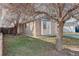Charming single-story home with brick and siding, complemented by a well-maintained front yard at 2335 E Cherrywood Dr, Lafayette, CO 80026
