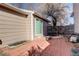 Outdoor patio featuring brick pavers, privacy fence, and access to backyard at 2335 E Cherrywood Dr, Lafayette, CO 80026