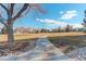 Serene walking path in the community, perfect for leisurely strolls and outdoor activities at 2335 E Cherrywood Dr, Lafayette, CO 80026
