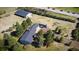 High angle aerial view shows home's two-car garage, driveway, and RV at 12518 N Dixon Dr, Parker, CO 80138