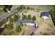 Wide aerial photo captures the home and barn from a high angle at 12518 N Dixon Dr, Parker, CO 80138