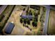 Birds eye view of home with mature evergreens and detached barn at 12518 N Dixon Dr, Parker, CO 80138