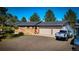 Charming ranch-style home with stone accents and a two-car garage at 12518 N Dixon Dr, Parker, CO 80138