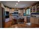 Spacious kitchen with island, stainless steel appliances, and plenty of storage space at 12518 N Dixon Dr, Parker, CO 80138