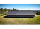 Large outbuilding with gray siding and roof with ample space for storage or workshop at 12518 N Dixon Dr, Parker, CO 80138