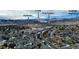 Aerial view showing proximity to shops and Chatfield High School at 7402 S Quail Cir # 1116, Littleton, CO 80127