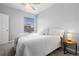Bright bedroom with a queen-size bed and a window at 7402 S Quail Cir # 1116, Littleton, CO 80127