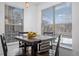 Dining area with table and chairs near a sunny window at 7402 S Quail Cir # 1116, Littleton, CO 80127