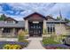 Community clubhouse entrance with landscaping at 7402 S Quail Cir # 1116, Littleton, CO 80127