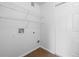 Laundry room with shelving and hookups for washer/dryer at 7402 S Quail Cir # 1116, Littleton, CO 80127